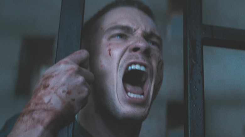 Trevor screaming through bars