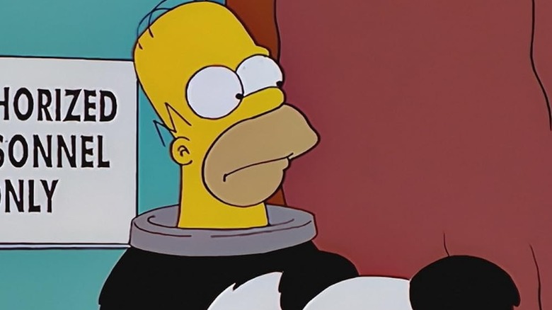 Homer Simpson preparing to dress as a panda in "Homer vs. Dignity" (2000)