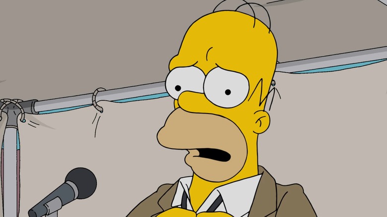 Homer Simpson nervously prepares to bomb at an open mic in The Simpsons