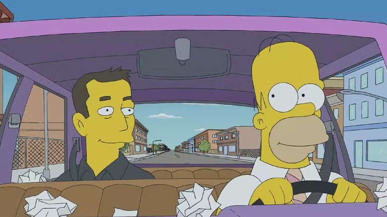 Elon Musk being driven around by Homer in "The Musk Who Fell to Earth" (2015)