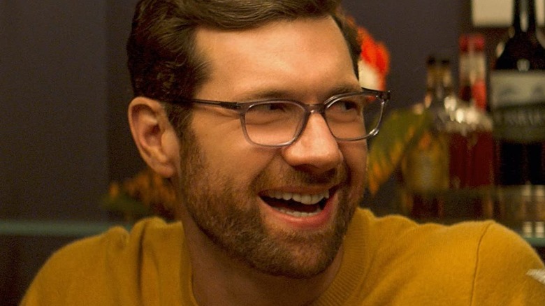 Billy Eichner posing at the gym