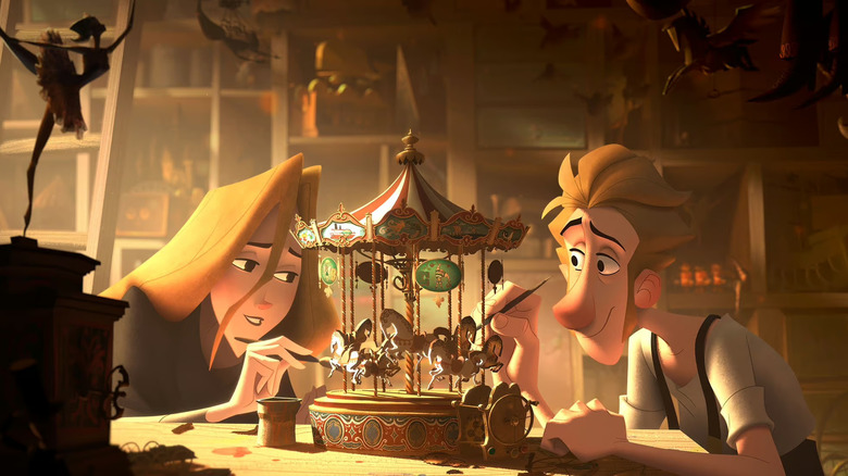Alva and Jesper painting a merry-go-round toy
