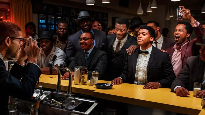 Malcolm X Jim Brown Sam Cooke and Cassius Clay at a bar in One Night in Miami