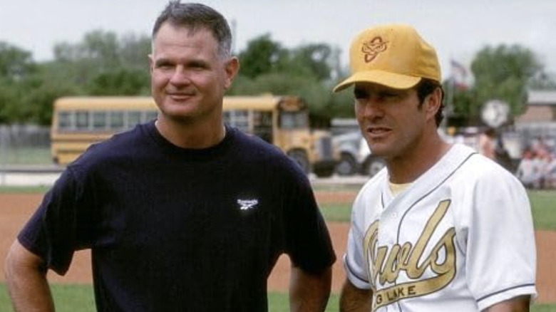 Jim Morris and Dennis Quaid talking on set of The Rookie