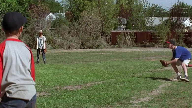 The Sandlot kids playing baseball in park