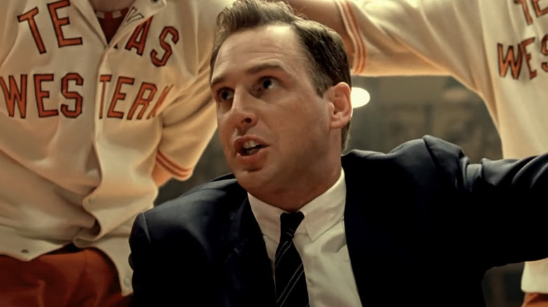 Coach Haskins (Josh Lucas) yells at the team in a huddle in Glory Road.