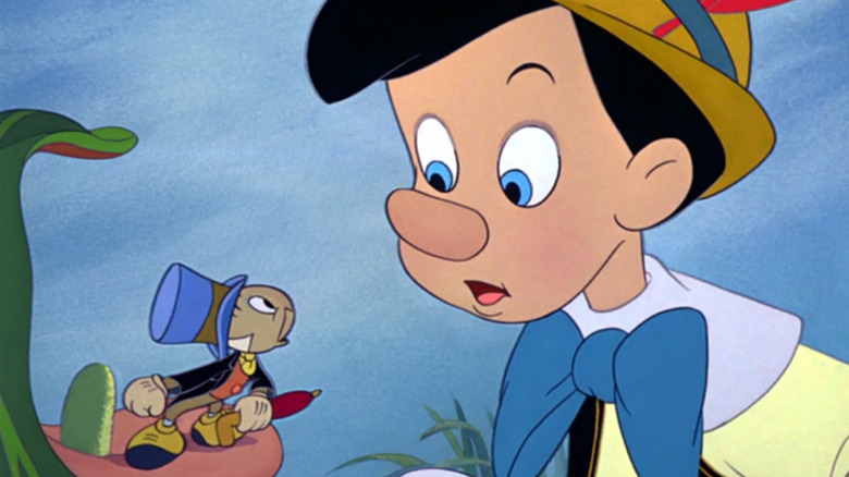 Jiminy looking up to talk to Pinocchio in "Pinocchio"