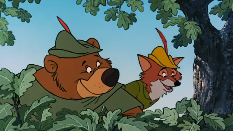 Robin and Little John looking down from tree in "Robin Hood"