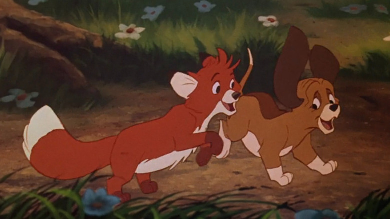 Tod and Cooper playing when they were young in "The Fox and the Hound"