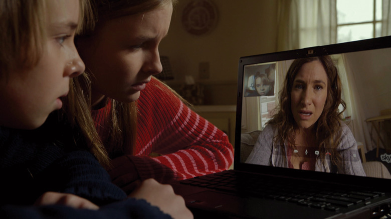 Tyler and Rebecca video chatting with Loretta in The Visit (2015)