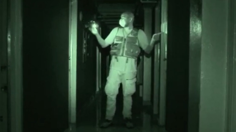 Jason in a hallway at the Cecil Hotel in "Ghost Adventure"