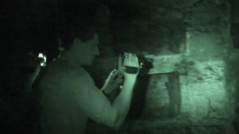 Zak in the vaults below Edinburgh in "Ghost Adventures"