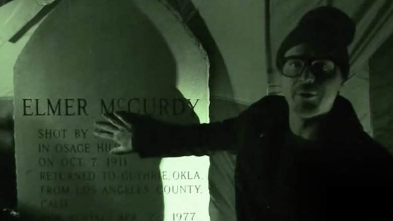 Zak Bagans touches Elmer McCurdy's grave in "Ghost Adventures"