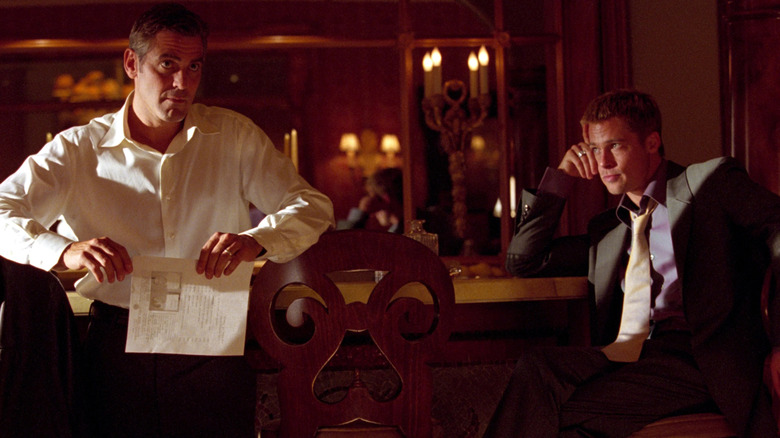 Danny Ocean and Rusty discuss their plan in 'Ocean's Eleven' (2001)