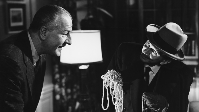 Alonzo and Doc examine stolen jewels in 'The Asphalt Jungle' (1950)