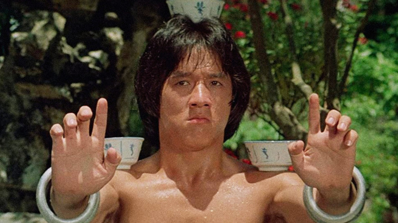 Wong balances teacups on his shoulders in Drunken Master