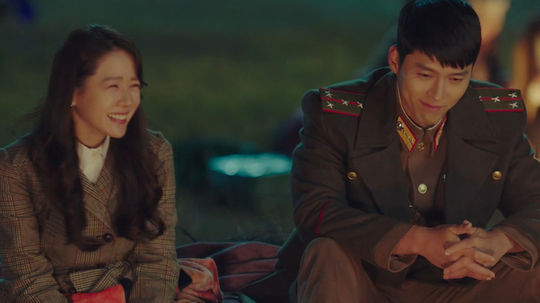 Yoon Se-ri and Ri Jeong-hyeok smiling together in Crash Landing on You (2019)