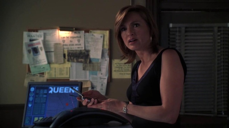 Benson in a cocktail dress on a speakerphone on Special Victims Unit