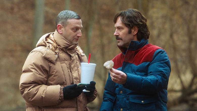 Craig and Austin walk through the woods in Friendship