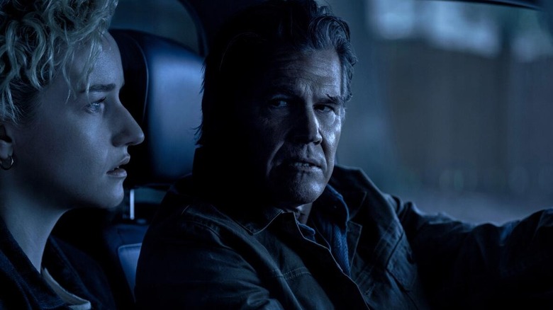 Archer and Justine talking in a car in Weapons