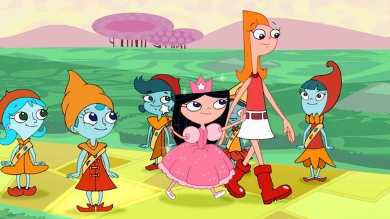 Candace being guided by Isabella as the Good Witch in Wizard of Odd