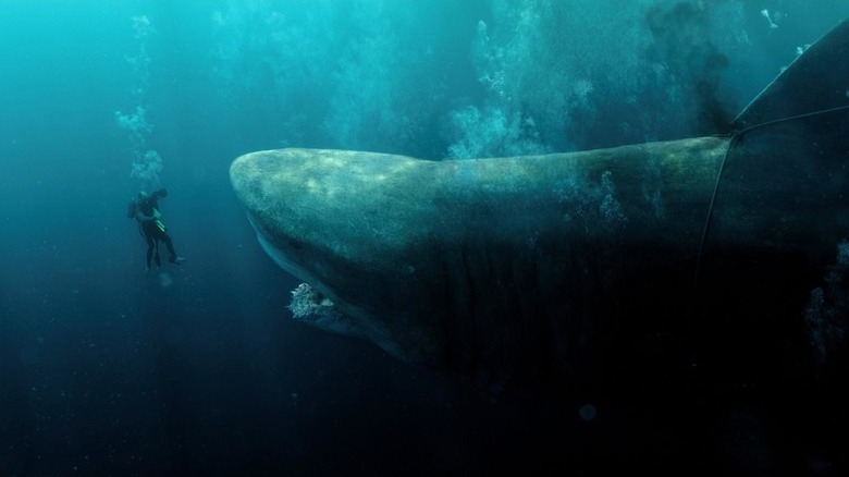 The Meg approaching divers underwater in "The Meg"