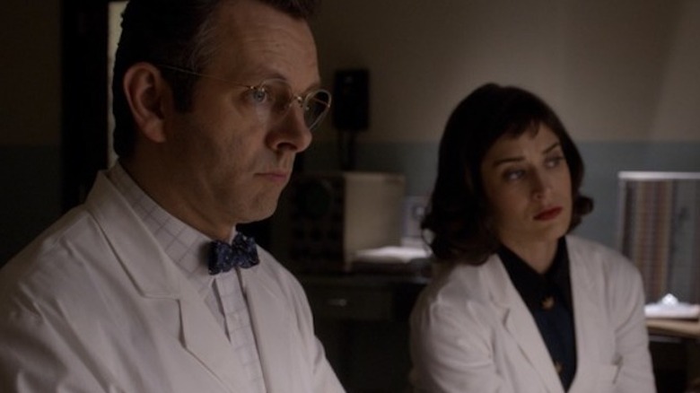 William and Virginia study something off screen in Masters of Sex