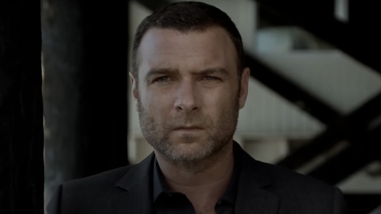 Donovan stands under a pier in Ray Donovan