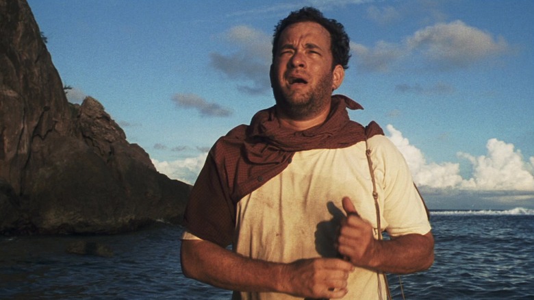 Chuck Noland surviving in "Cast Away" (2000)