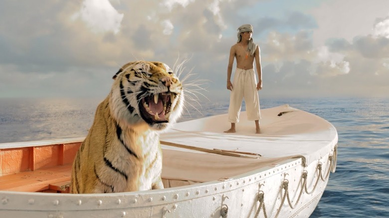 Pi in a boat with a tiger in "Life of Pi" (2012)