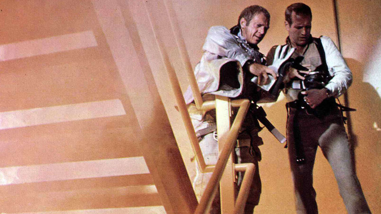 O'Halloran and Roberts fight the flames in a stairwell in "The Towering Inferno" (1974)
