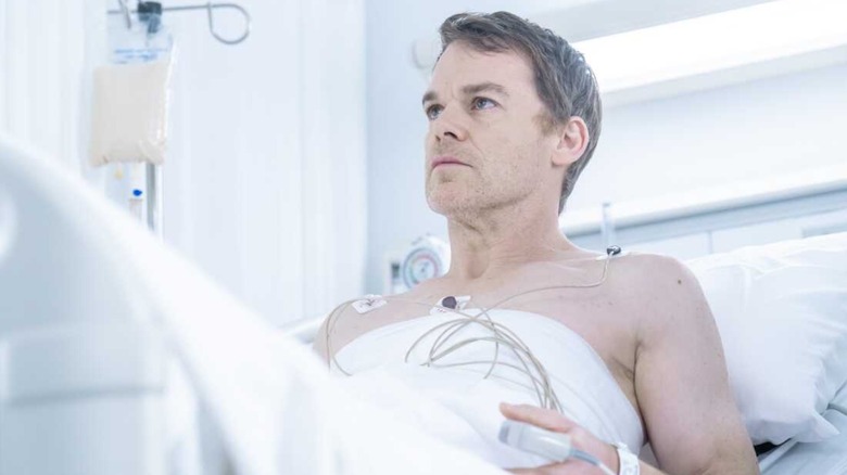 Dexter Morgan lying in a hospital bed in "Dexter: Resurrection"