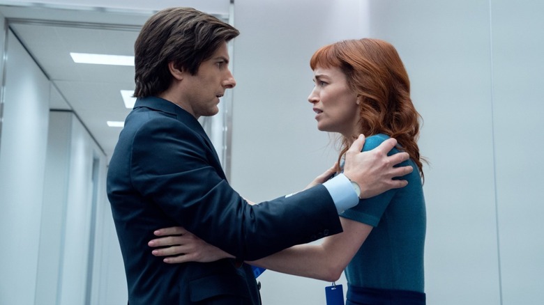 Mark S. embraces Helly R. in a corridor in "Severance" Season 2
