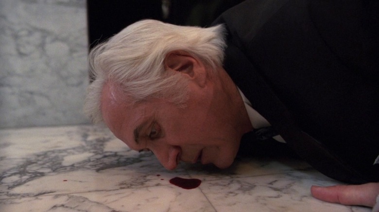 Jesús Gris licking up blood in "Cronos"