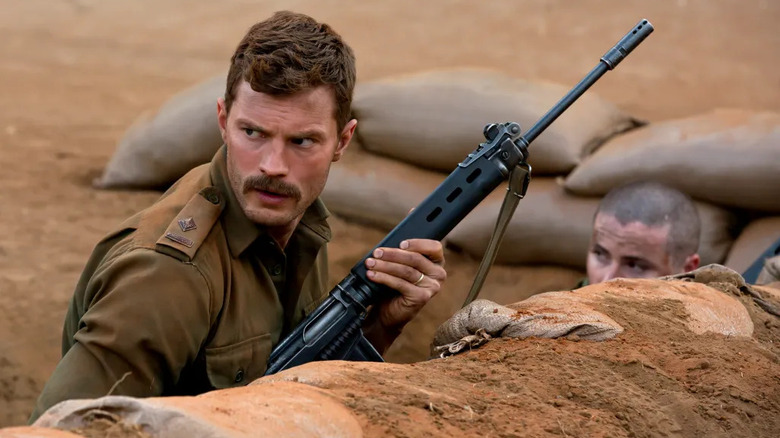 Quinlan readies his rifle in the trench in The Siege of Jadotville (2016)