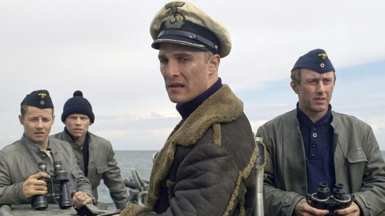 On the top deck of the sub, Lt. Tyler looks over his shoulder in U-571 (2000)