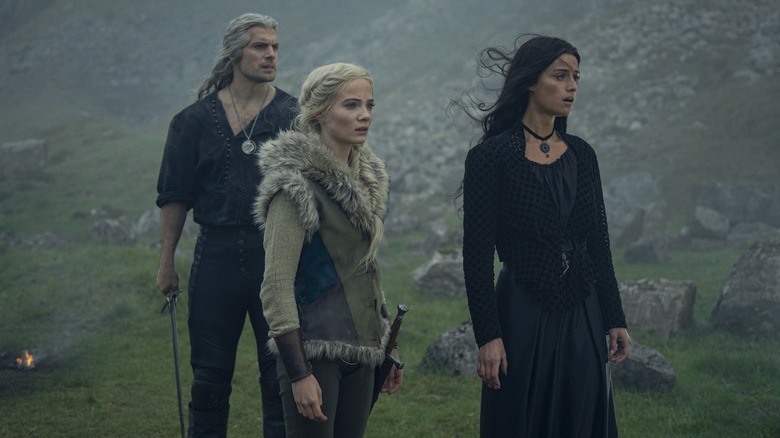 Geralt, Ciri, and Yennifer survey the land