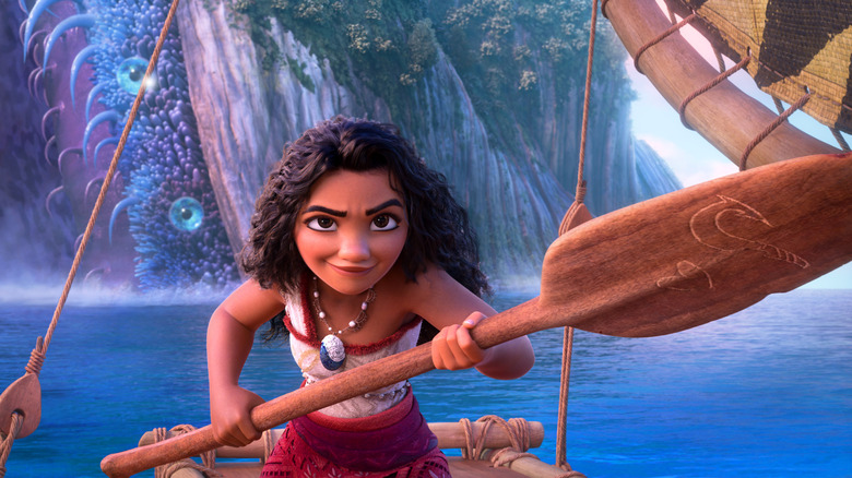 Moana smiling and holding an oar (2024)
