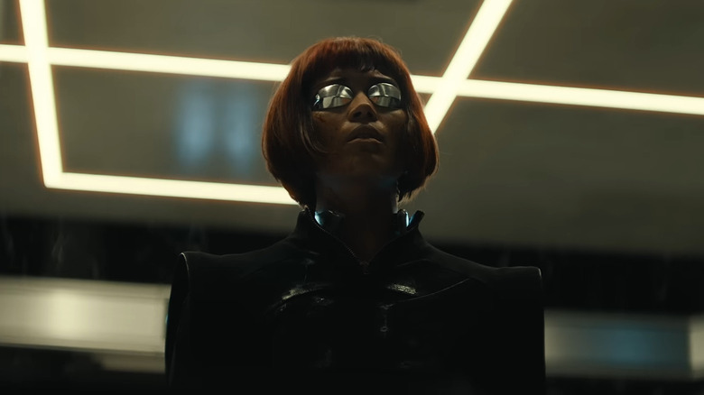 Molly Millions riding in an elevator in Neuromancer (2027)