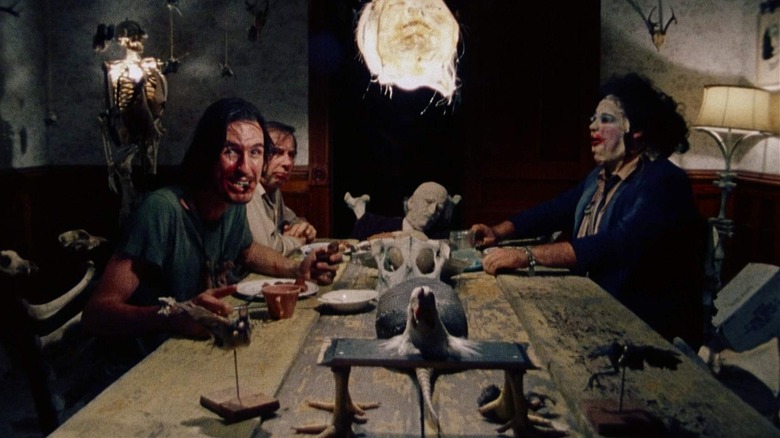 The family sits around the dinner table in "The Texas Chain Saw Massacre" (1974)