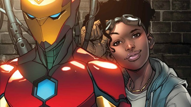 Riri Williams smiling behind her Ironheart armor