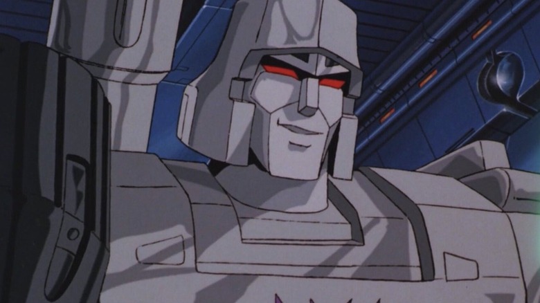 Frank Welker's Megatron smiling ominously in The Transformers: The Movie