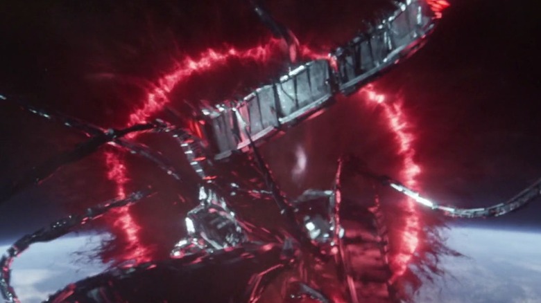 Giant metal robot tentacles emerge from a red portal in space on "Star Trek: Picard" (2020-2023)