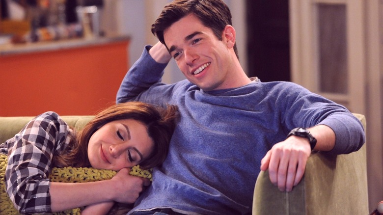 John and Jane sitting on the couch in "Mulaney"