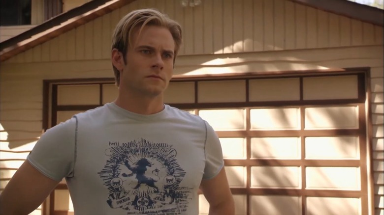 Flash Gordon wearing a white t-shirt in Flash Gordon