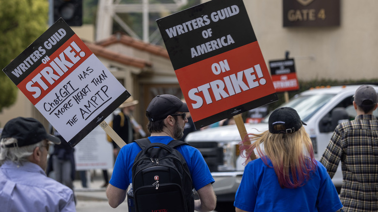 People holding signs