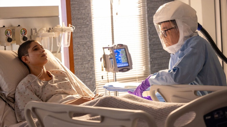 Daniel Charles tends to an ill Macy in 