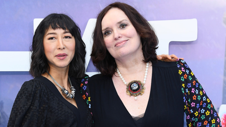 Director Megan Nicole Dong and Deborah Frances-White posing at "That Christmas" gala (2024)