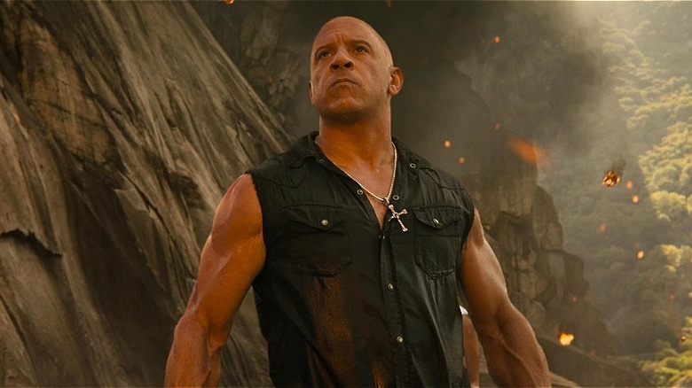 Dom standing outside triumphantly in "Fast X"