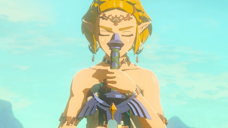 Zelda clutching the Master Sword in "The Legend of Zelda: Tears of the Kingdom"